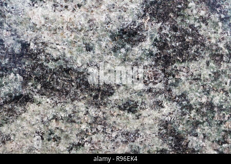 Granite texture macro. White, black, grey. Stock Photo