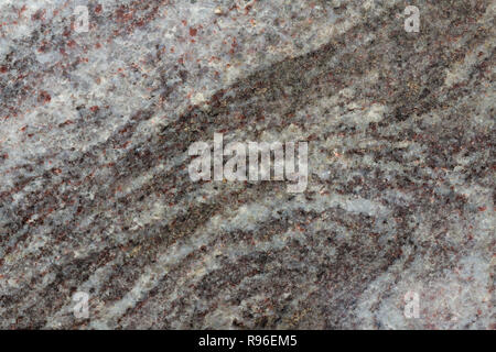 Granite texture macro. White, black, red. Stock Photo