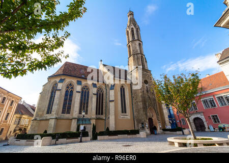 The Benedictine or Blessed Mary church in the Medieval inner-city of Sopron, Hungary. Its nickname is Goat church referring to a legend. Stock Photo