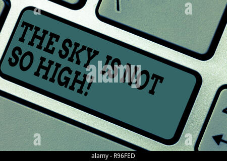 Text sign showing The Sky Is Not So High. Conceptual photo Motivation to grow as much as you want limitless Keyboard key Intention to create computer  Stock Photo