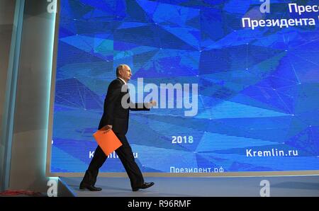 Moscow, Russia. 20th December, 2018. Russian President Vladimir Putin walks onstage to begin his traditional end of year news conference December 20, 2018 in Moscow, Russia. Putin warned that the world is underestimating the threat of nuclear war and blamed the U.S. for risking a collapse in global arms controls. Credit: Planetpix/Alamy Live News Stock Photo