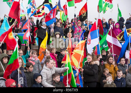 Lockerbie, Scotland, UK. 20th Dec, 2018. A Wish for Peace at Lockerbie Primary School. Children from Lockerbie Primary School will take part in a World Peace Flag Ceremony in the school grounds supported by Allanton World Peace Sanctuary. It is a celebration of diversity carrying flags of all nations, plus the Earth flag, and placing a special emphasis on 21 nations with passengers and crew on the plane. The plan is communicate the young people's wish for peace in the world. Credit: Allan Devlin/Alamy Live News Stock Photo
