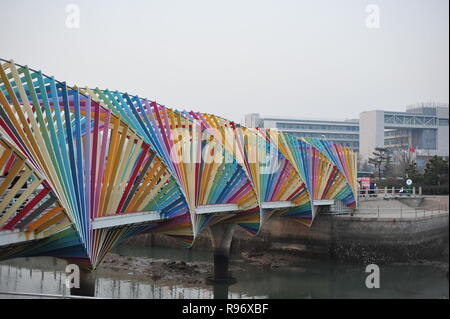 Qingdao, China. 20th Dec, 2018. The overpass of rainbow can be seen at Tangdao Bay Park in Qingdao, east China's Shandong Province. Credit: SIPA Asia/ZUMA Wire/Alamy Live News Stock Photo