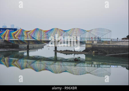 Qingdao, China. 20th Dec, 2018. The overpass of rainbow can be seen at Tangdao Bay Park in Qingdao, east China's Shandong Province. Credit: SIPA Asia/ZUMA Wire/Alamy Live News Stock Photo