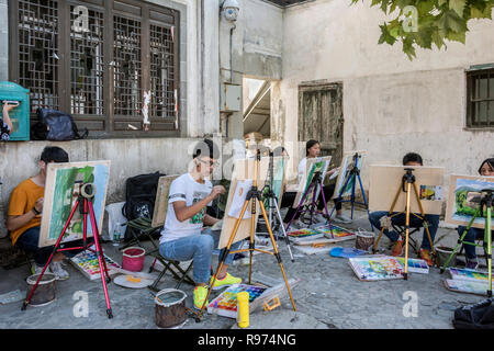 Art class on the street in Hongcun Ancient Town, Lixian, Anhui, China Stock Photo