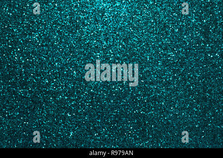 Navy blue sparkling background from small sequins, closeup. Brilliant shiny backdrop from textile. Shimmer denim paper Stock Photo