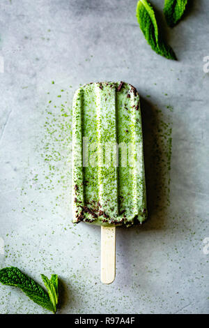 Matcha and  mint chocolate chip popsicles Stock Photo