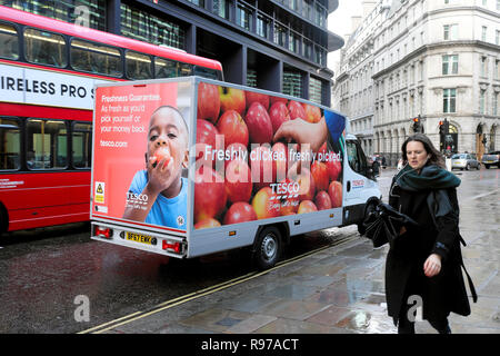 Tesco food delivery van parked in Threadneedle Street in The City of London UK  KATHY DEWITT Stock Photo