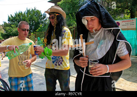 Zagreb, Croatia - June 12, 2011: Funny crew in funny costumes drinking before the race Red Bull Soapbox Stock Photo