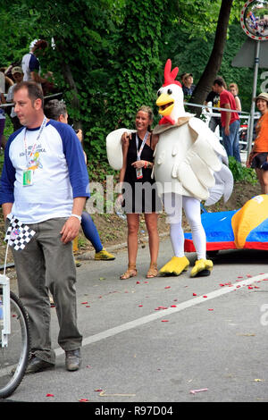 Zagreb, Croatia - June 12, 2011: Funny pilot in funny costume posing with the girl on Red Bull Soapbox Stock Photo