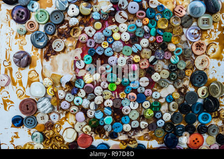 Lots of different colored buttons glued to the wall in North Nicosia (Turkish). Cyprus November 2018 Stock Photo