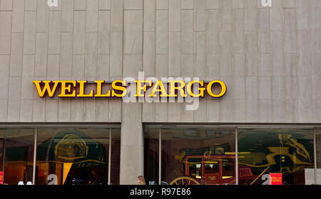 Wells Fargo sign outside on bank building Stock Photo