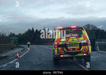 Traffic accident motorway police Traffic Officers car putting out warning cones 2010s 2018 HOMER SYKES. Stock Photo