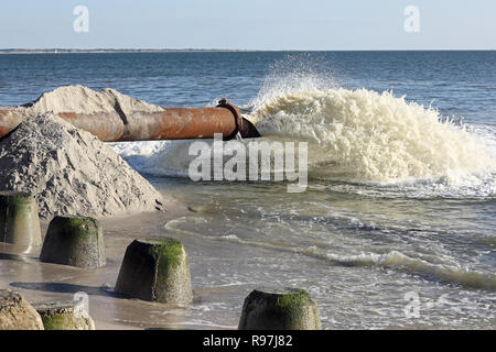 Sand replenishment for the coast protection on Sylt Stock Photo