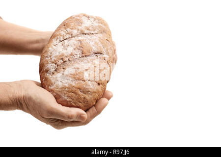 Hands of an elderly person holding a loaf of bread isolated on white background Stock Photo