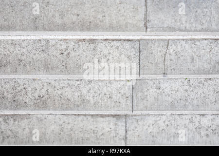 Abstract background - concrete light grey stairs. Selective focus. Stock Photo