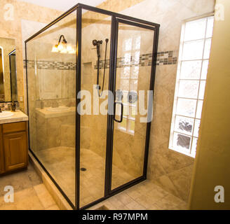 Large Corner Shower In Tiled Bathroom Stock Photo