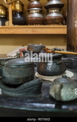 Authentic ladakhi oven with pots on it in Ladakh region, India Stock Photo