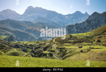Landscape with path between mountains Stock Photo