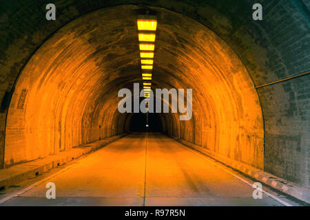 Illuminated Street Tunnel, Light at the end of the tunnel Stock Photo