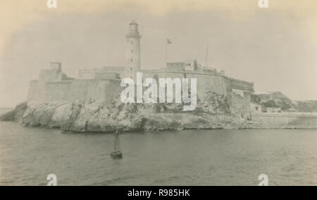 Antique c1940 photograph, Morro Castle and lighthouse in Havana, Cuba. Morro Castle is a fortress guarding the entrance to Havana bay in Havana, Cuba. SOURCE: ORIGINAL PHOTOGRAPH Stock Photo