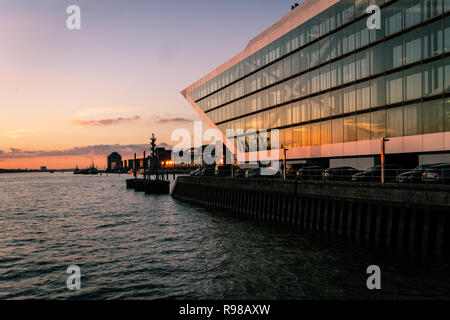 HAMBURG, GERMANY - November 8, 2018:  Scenic view of the iconic 'Dockland' building in the Harbour of Hamburg near Altona at Sunset. Stock Photo