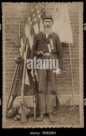 Unidentified Civil War Veteran from Grand Army of the Republic, Portrait in Uniform with Musket, 1880's Stock Photo