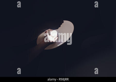 Hands changing with new LED lamp light bulb,Power saving concept. Stock Photo