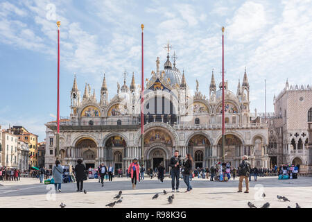 Venice, Italy - March 21, 2018: Tourists at San Marco square at sunny spring day in Venice, Italy Stock Photo