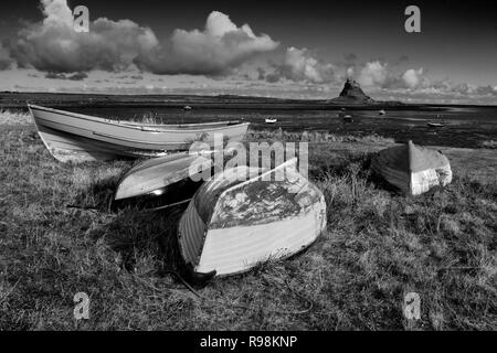 Boats at Lindisfarne in mono Stock Photo