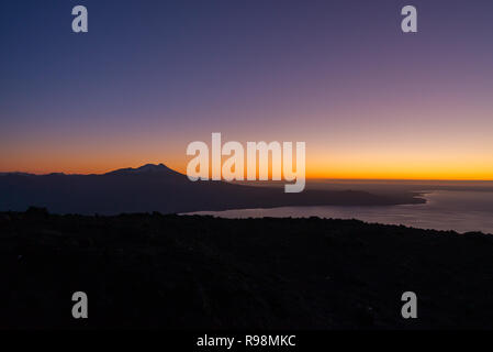 Aerial view with drone from the ski center in the volcano Osorno, Puerto Varas. With Lake Llanquihue and the Calbuco Volcano at sunset Stock Photo