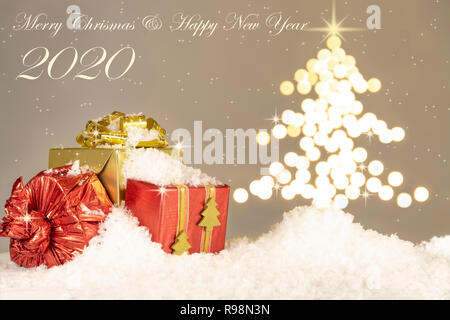Christmas theme card with lights shaped tree and snow Stock Photo