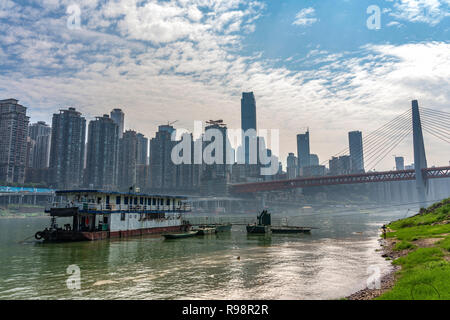 CHONGQING, CHINA - SEPTEMBER 19: This is a river view of boats docked near the Chaotianmen dock the city on September 19, 2018 in Chongqing Stock Photo