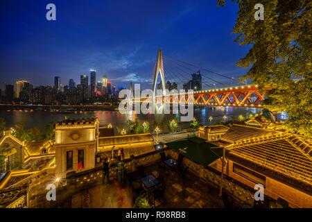 CHONGQING, CHINA - SEPTEMBER 22: This is a night view of Dongshuimen bridge from Longmenaho old street on September 22, 2018 in Chongqing Stock Photo