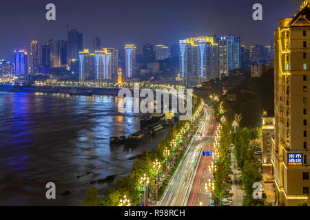 CHONGQING, CHINA - SEPTEMBER 22: This is a view of Nanbin road riverside city buildings at night on September 22, 2018 in Chongqing Stock Photo