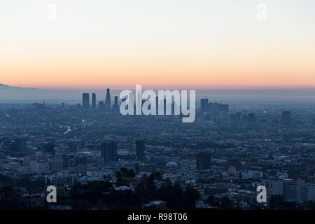 Predawn cityscape view of Hollywood and downtown Los Angeles, California.  Shot from Runyon Canyon Park hiking trail in the Santa Monica Mountains. Stock Photo