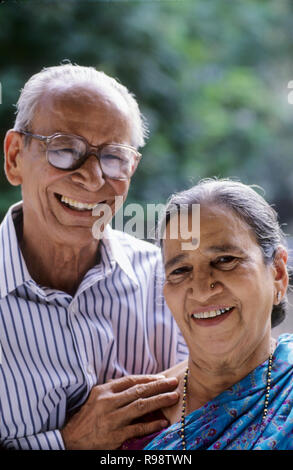 aged couple sitting together, MR. NO. 318, 319 Stock Photo