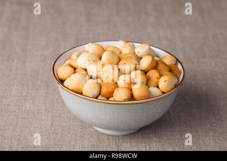 Kūčiukai (also šližikai) is a traditional Lithuanian dish served on Kūčios, the traditional Christmas Eve dinner in Lithuania. Sweet pastries made fro Stock Photo