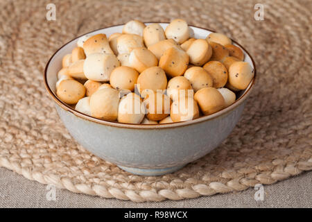 Kūčiukai (also šližikai) is a traditional Lithuanian dish served on Kūčios, the traditional Christmas Eve dinner in Lithuania. Sweet pastries made fro Stock Photo