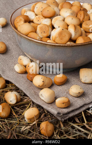 Kūčiukai (also šližikai) is a traditional Lithuanian dish served on Kūčios, the traditional Christmas Eve dinner in Lithuania. Sweet pastries made fro Stock Photo