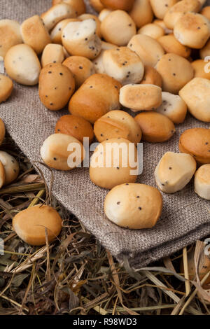 Kūčiukai (also šližikai) is a traditional Lithuanian dish served on Kūčios, the traditional Christmas Eve dinner in Lithuania. Sweet pastries made fro Stock Photo