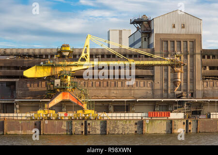 Unloading crane for grain in the harbor Stock Photo