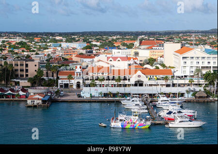 Views of Renaissance Marina Aruba with colourful yachts and designer shops Stock Photo