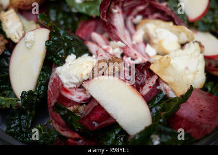 Beetroots leaves salad with hot goat cheese Stock Photo