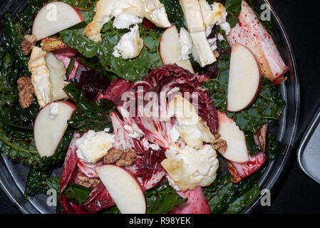 Beetroots leaves salad with hot goat cheese Stock Photo