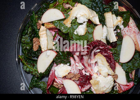 Beetroots leaves salad with hot goat cheese Stock Photo