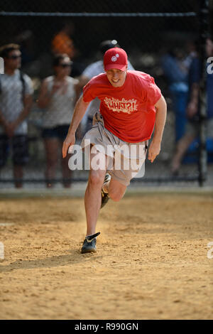 Softball players in Central Park in New York City Stock Photo