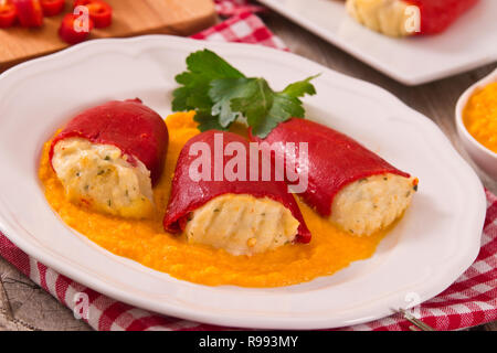 Stuffed piquillo peppers with cod. Stock Photo