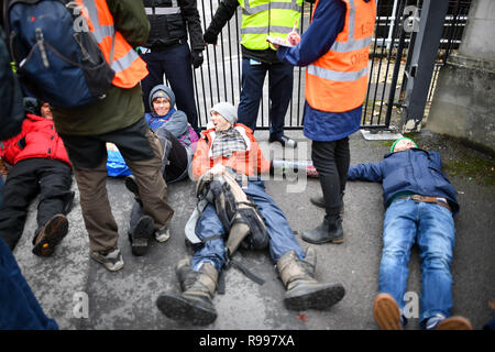 Climate change activists from Extinction Rebellion chain themselves together outside the BBC Bristol building on Whiteladies Road, Clifton, Bristol, during a peaceful protest against the way they think the broadcaster covers the 'climate emergency'. Stock Photo