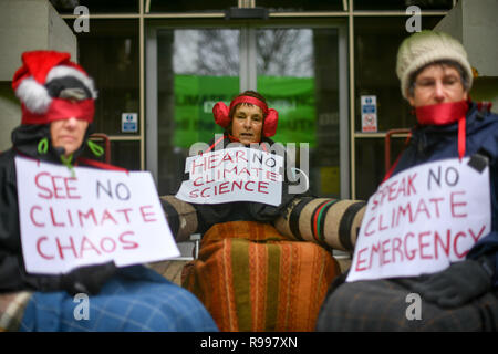 Climate change activists from Extinction Rebellion chain themselves together outside the BBC Bristol building on Whiteladies Road, Clifton, Bristol, during a peaceful protest against the way they think the broadcaster covers the 'climate emergency'. Stock Photo